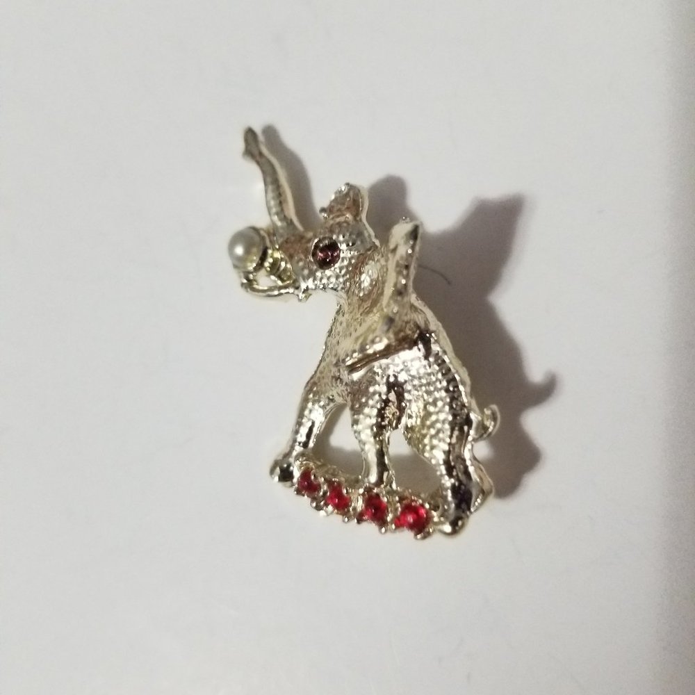 Vintage Elephant Brooch with Rubies, Amethyst Eye, and Pearl Trunk